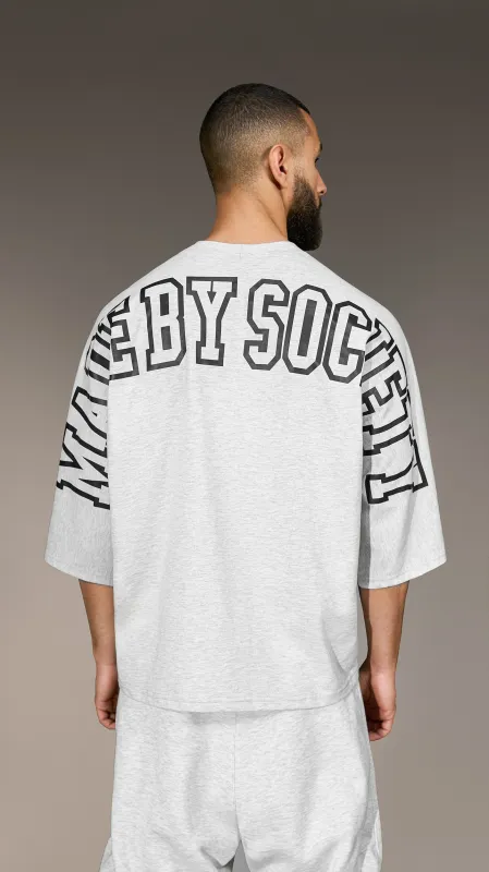 "Made by Society" Oversized T-Shirt – T15595 sold by Made by Society