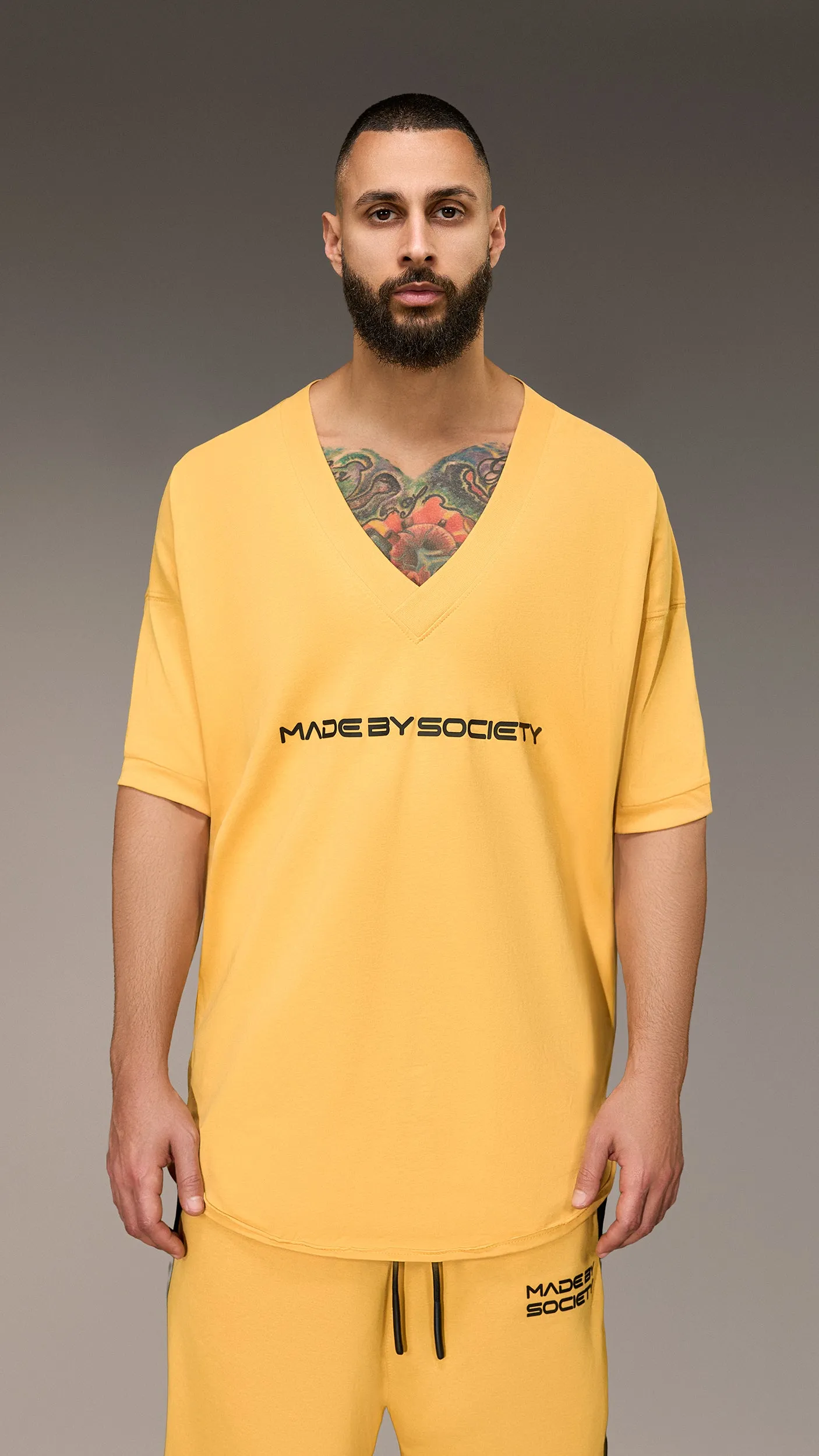 Made by Society T-shirt with Neckline - T16084 sold by Made by Society