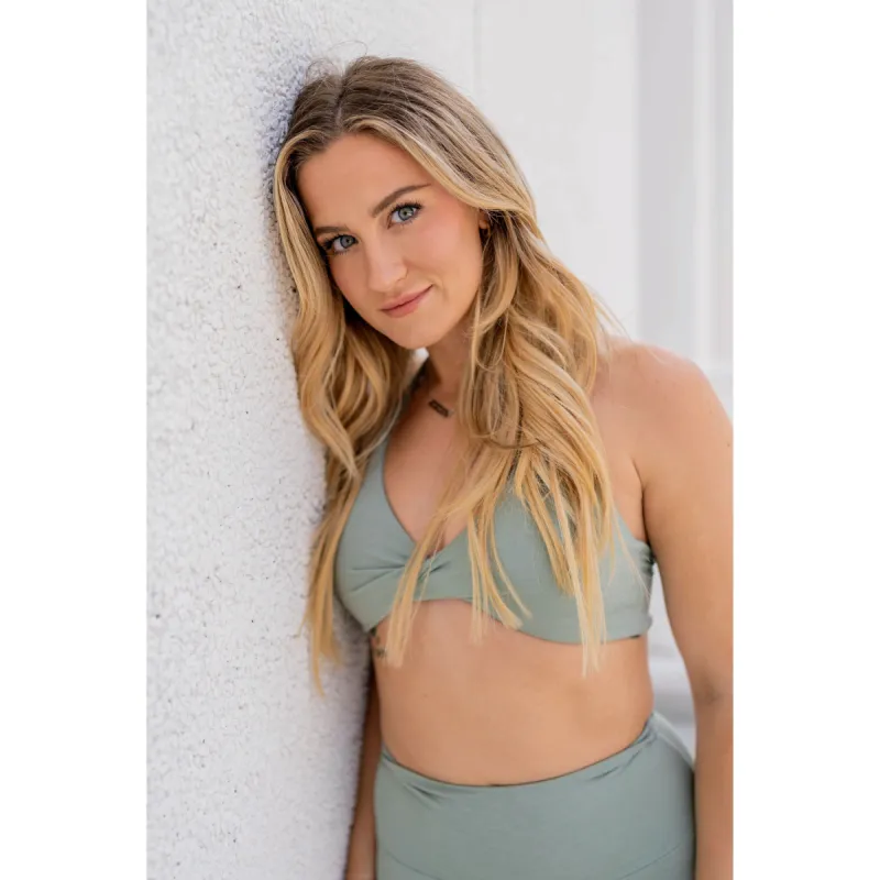 Momentum Twist Sports Bra - Sage sold by Emoni Fit