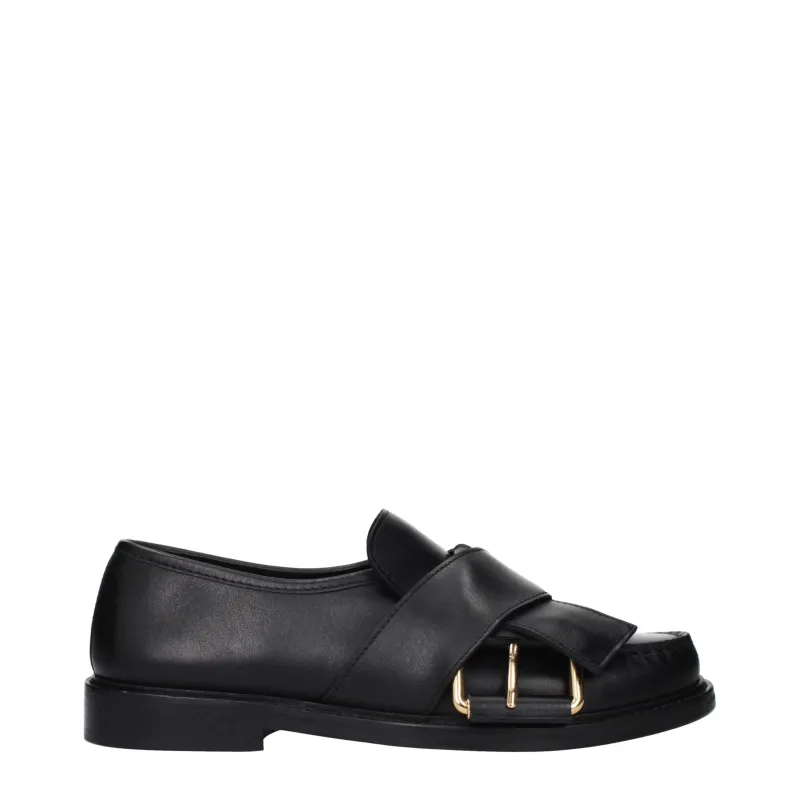 Moschino Black Leather Slip-On Loafers sold by Siebentaschen