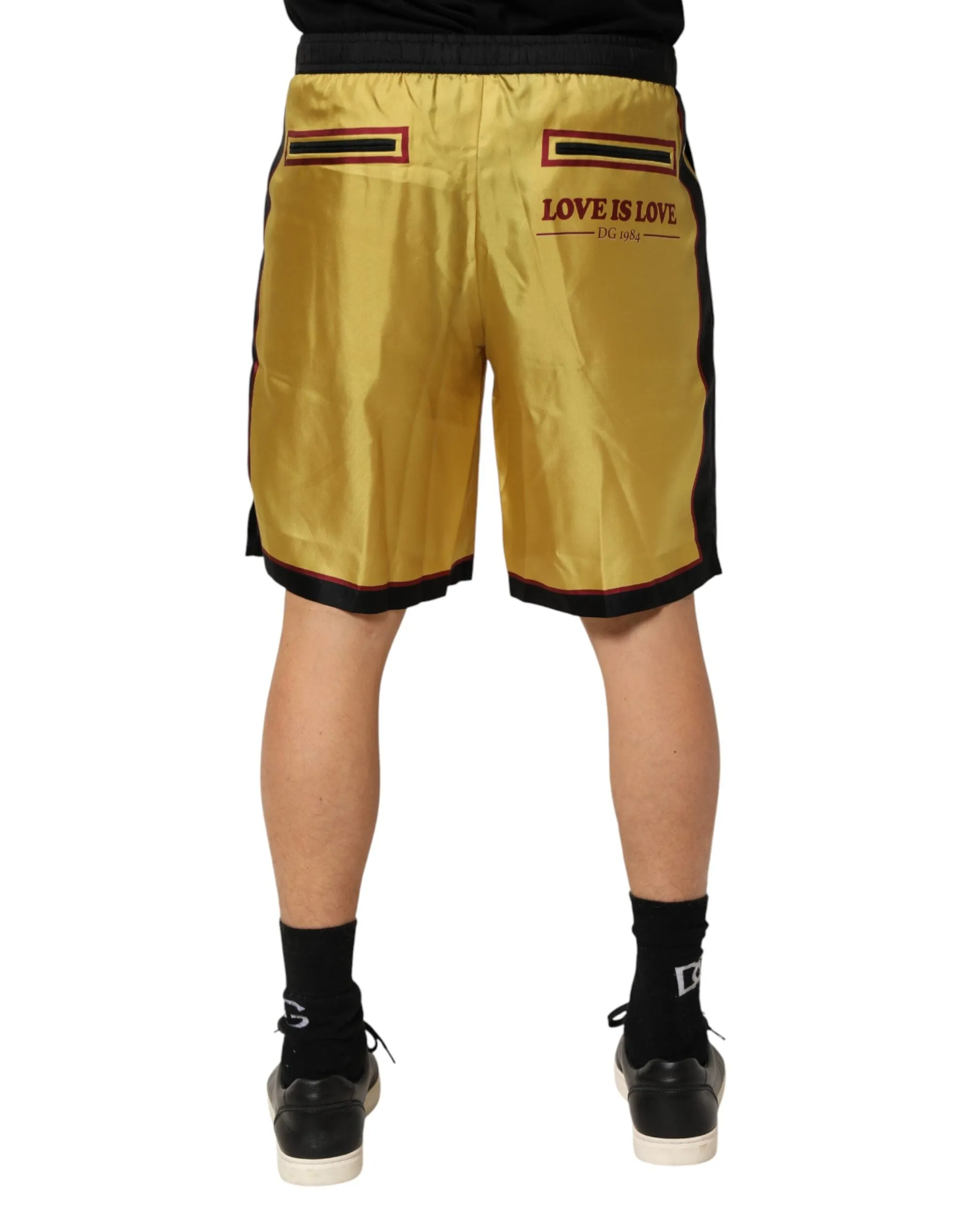 Dolce & Gabbana Yellow Floral Print Silk Men Bermuda Shorts sold by Siebentaschen product image thumbnail 4