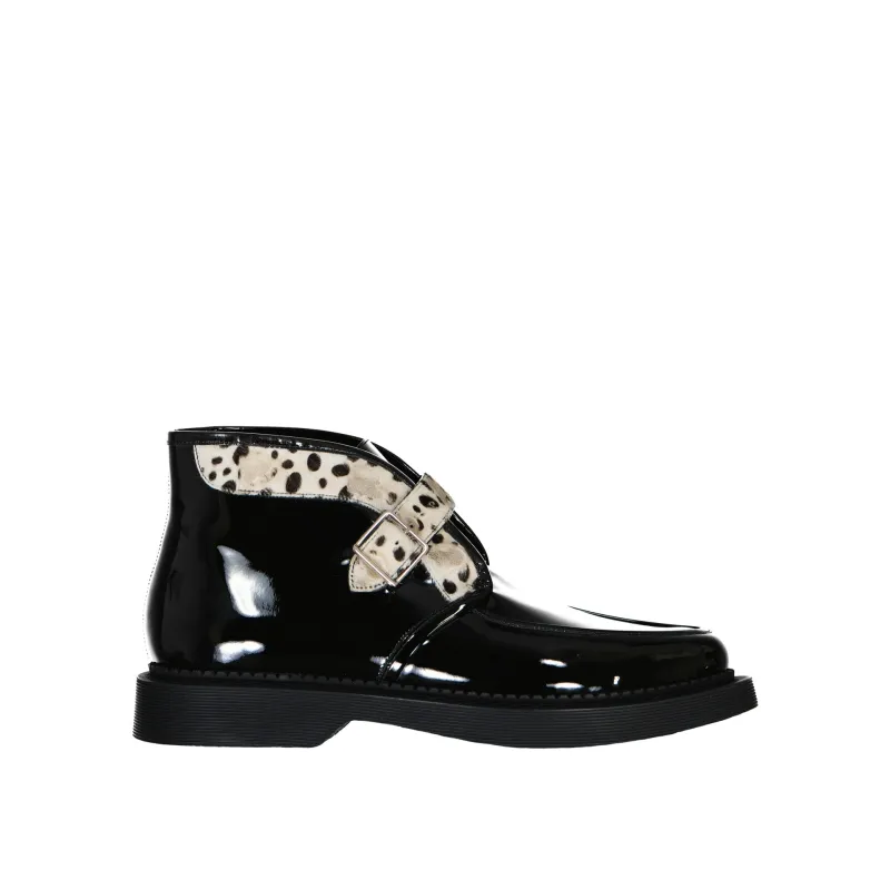 Saint Laurent Leather And Fur Boots sold by Siebentaschen