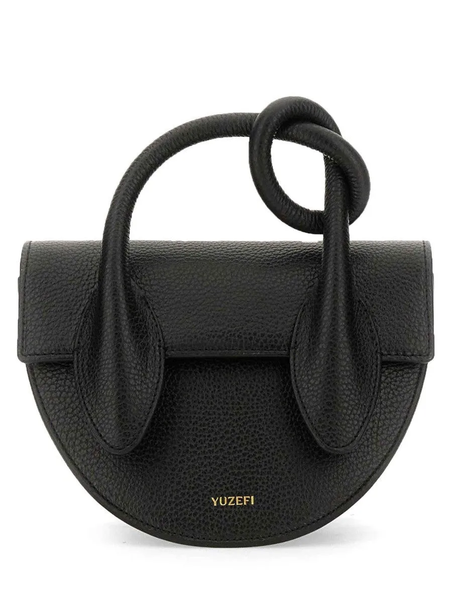 YUZEFI "PRETZEL" BAG sold by Siebentaschen