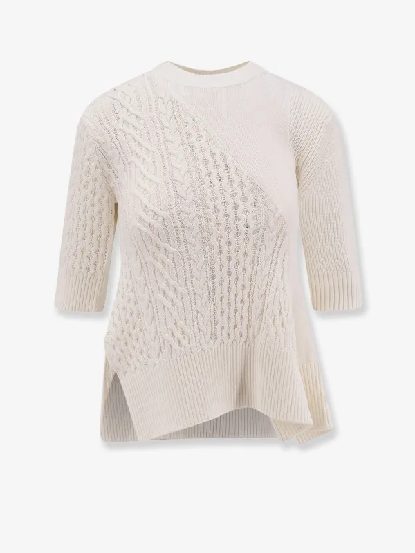 SACAI Asymmetrical cotton blend sweater sold by Siebentaschen