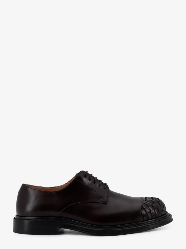 Bottega Veneta James leather lace-up shoe sold by Siebentaschen