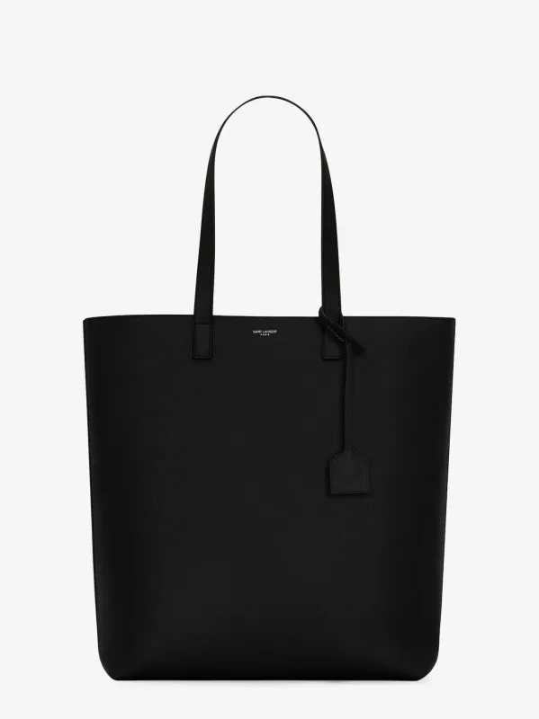Saint Laurent North/South leather tote bag sold by Siebentaschen