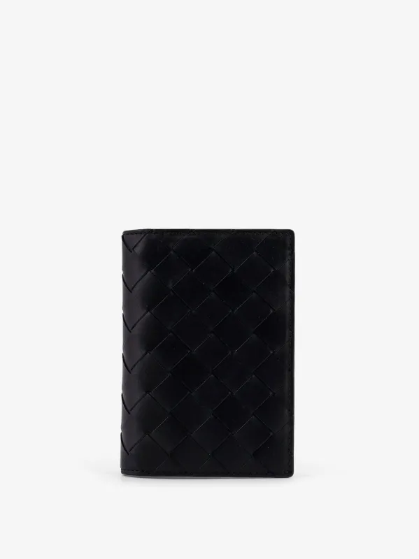 Bottega Veneta Leather passport holder with Intrecciato motif sold by Siebentaschen