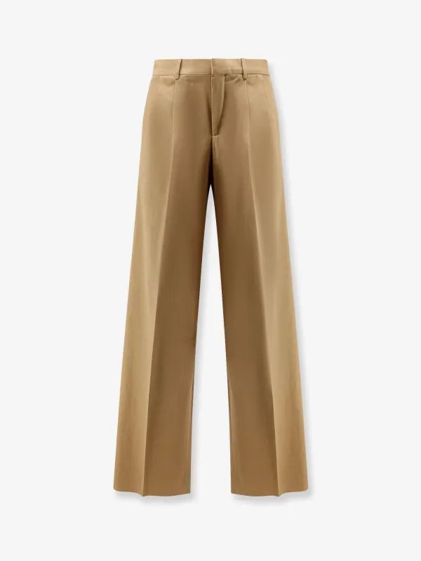 Celine Pleated cotton trousers sold by Siebentaschen