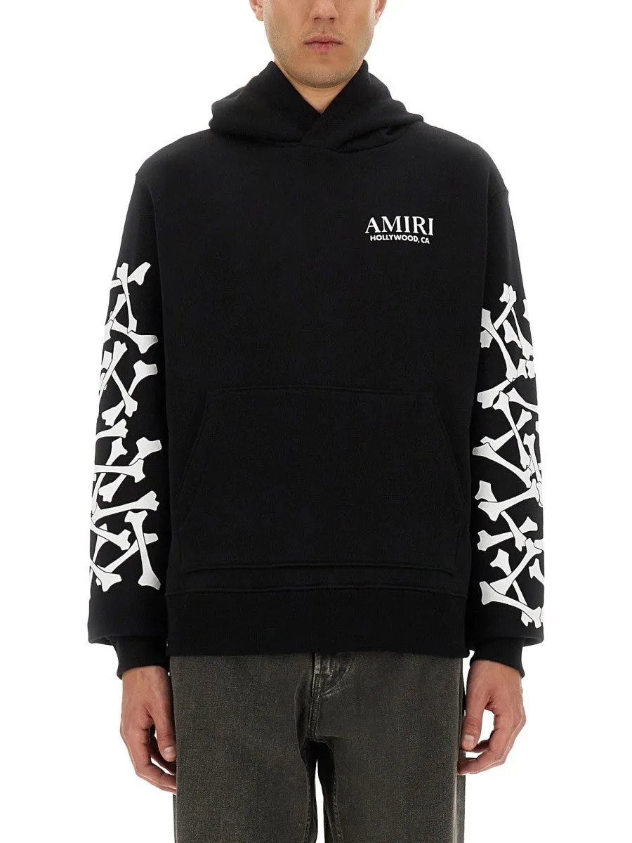 AMIRI STACKED BONES PRINT HOODIE sold by Siebentaschen