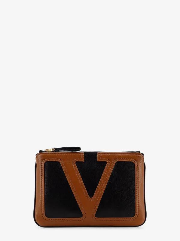 Valentino Garavani Viva Superstar leather clutch sold by Siebentaschen