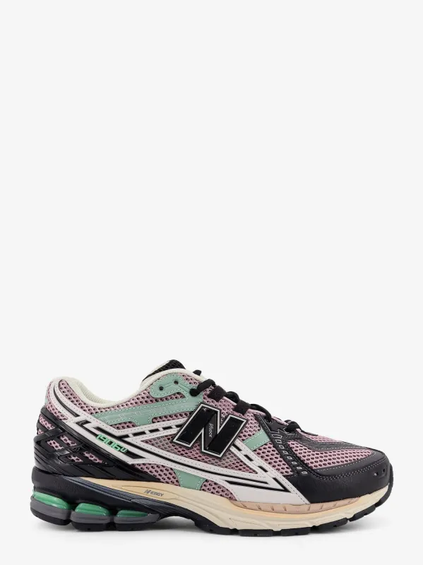 New Balance 1906U low-top mesh sneakers sold by Siebentaschen