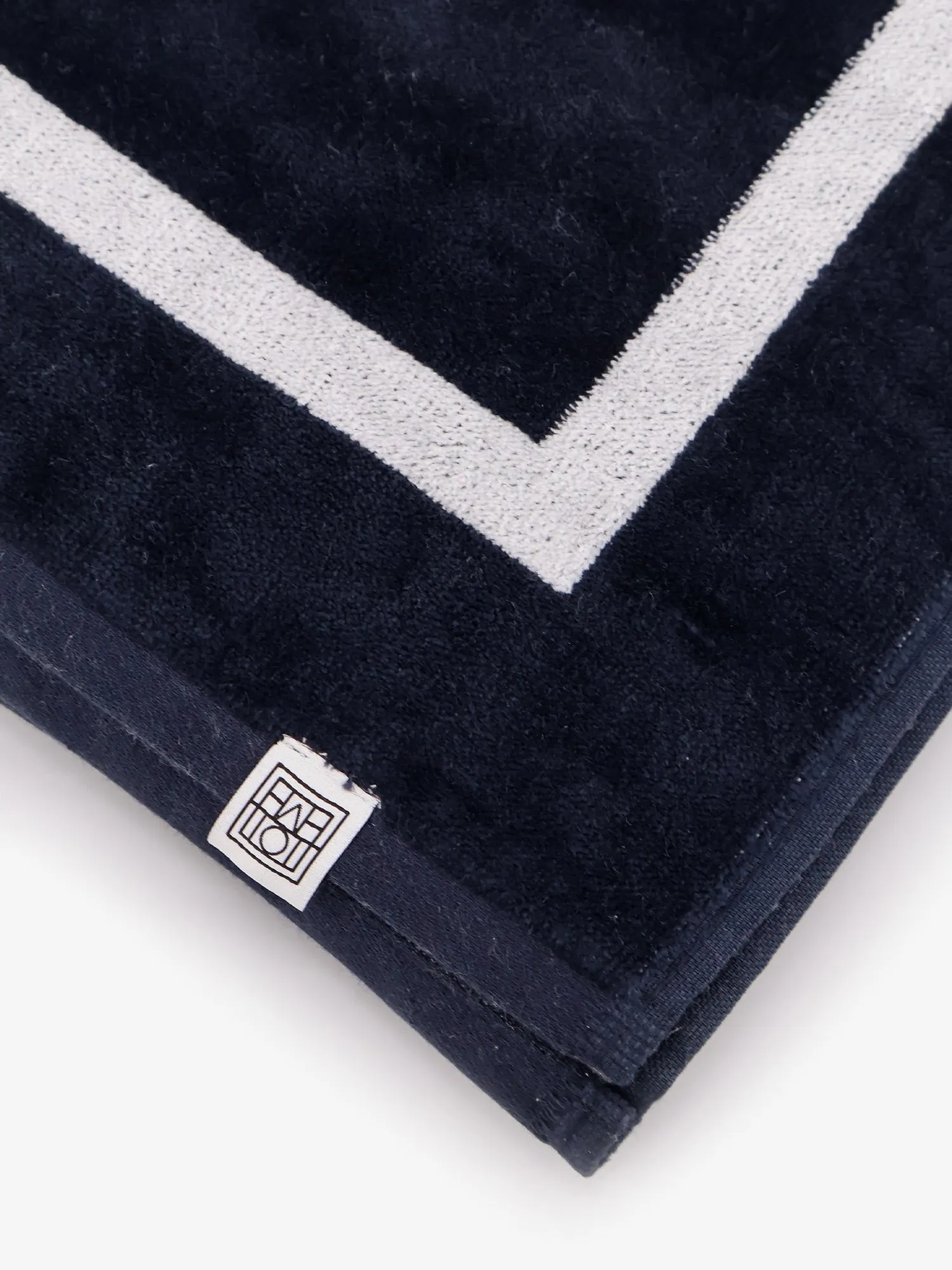 TOTEME Monogram organic cotton beach towel sold by Siebentaschen product image thumbnail 3