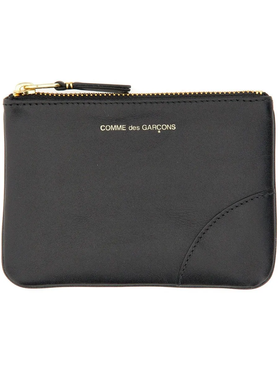 COMME DES GARCONS WALLET SMALL CLUTCH WITH ZIPPER sold by Siebentaschen