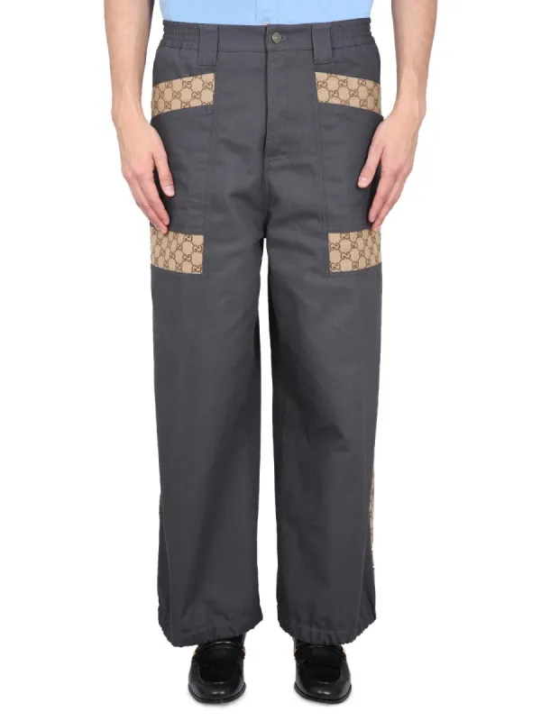 Gucci COTTON FABRIC PANTS WITH GG INSERTS sold by Siebentaschen