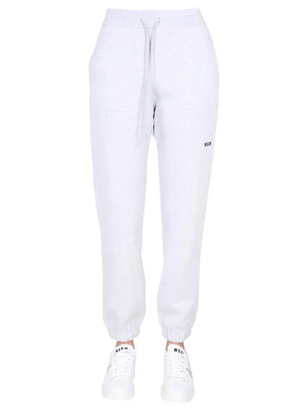 msgm JOGGING PANTS WITH LOGO PRINT sold by Siebentaschen