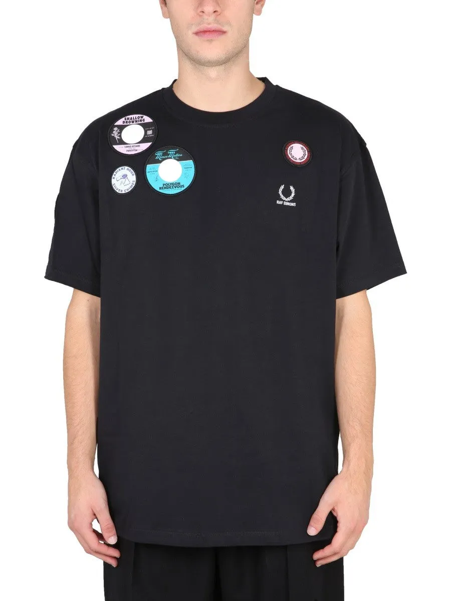 FRED PERRY X RAF SIMONS OVERSIZED T-SHIRT WITH PATCH sold by Siebentaschen