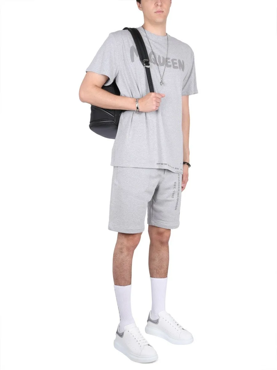 Alexander Mcqueen BERMUDA SHORTS WITH GRAFFITI LOGO PRINT sold by Siebentaschen product image thumbnail 2