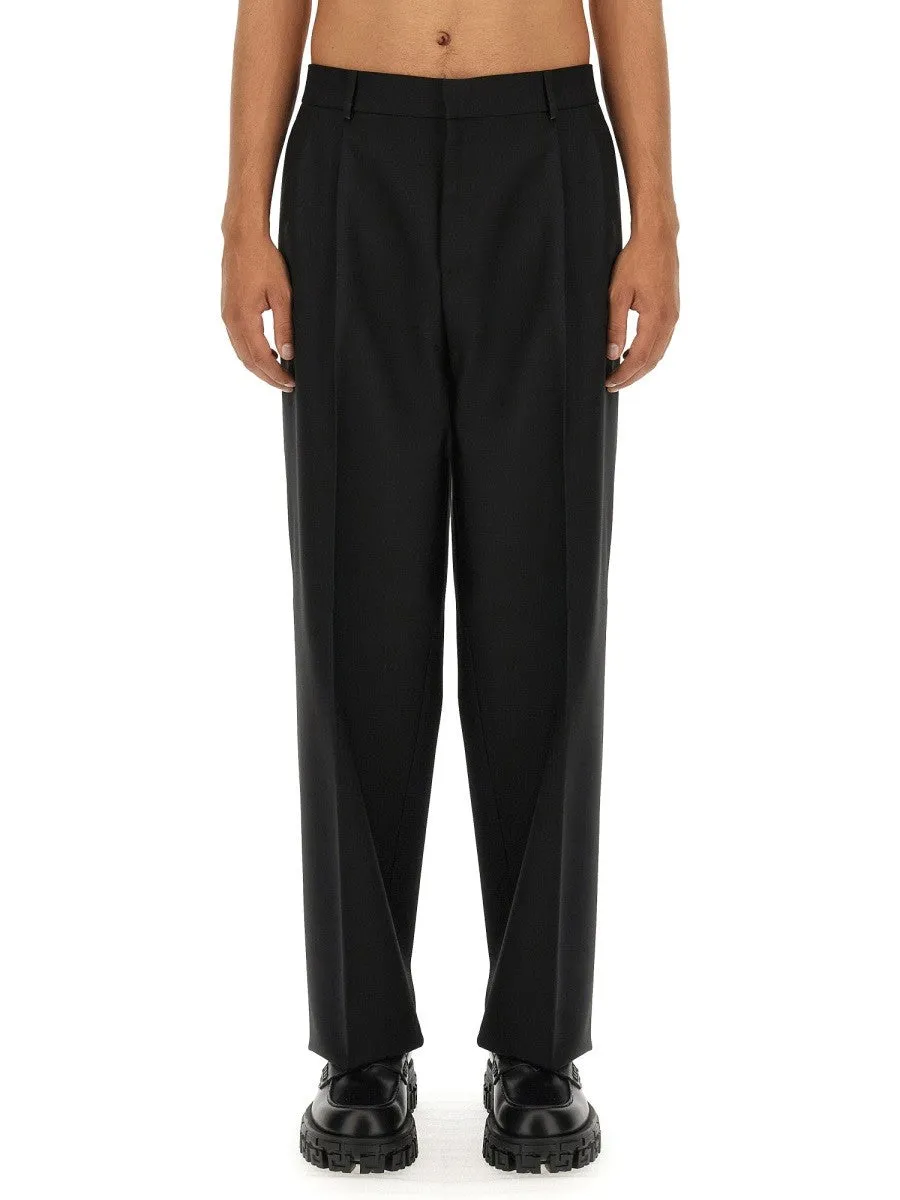 Versace WOOL PANTS sold by Siebentaschen