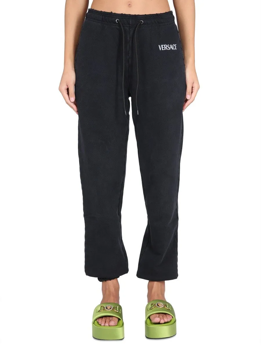 Versace JOGGING PANTS WITH LOGO sold by Siebentaschen