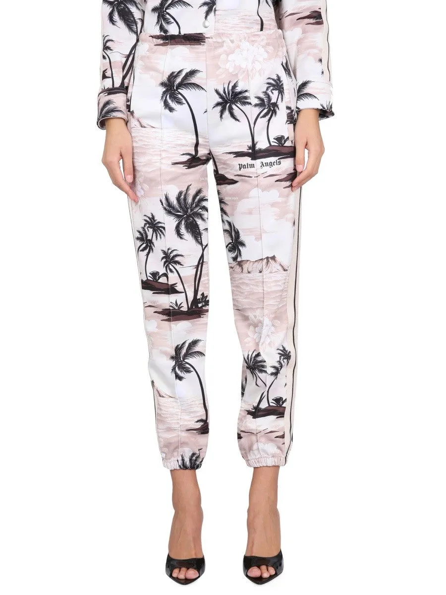 Palm Angels ISLAND PRINT PANTS sold by Siebentaschen