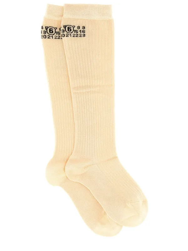 MM6 MAISON MARGIELA HIGH SOCKS. sold by Siebentaschen