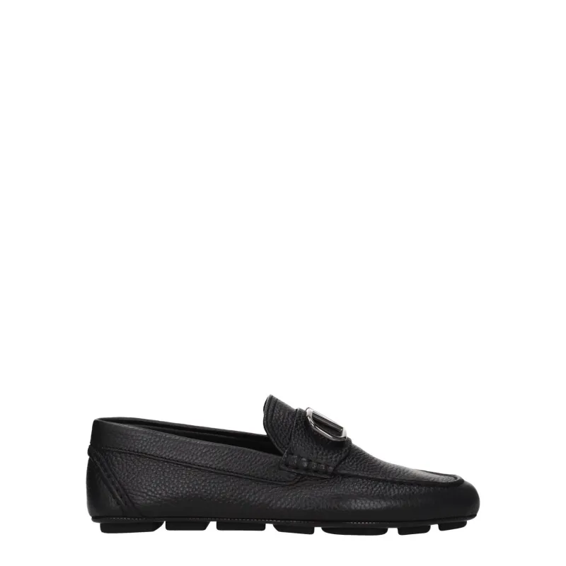 Valentino Garavani Black Leather Slip-On Loafers sold by Siebentaschen