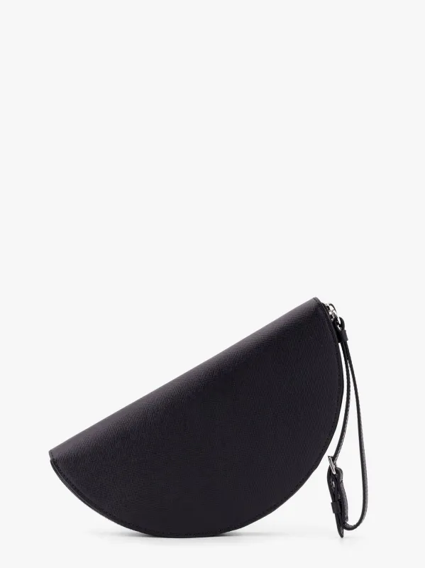 Maison Margiela Leather pochette with iconic four stitched detail sold by Siebentaschen