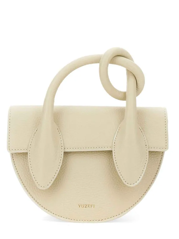 YUZEFI "PRETZEL" BAG sold by Siebentaschen