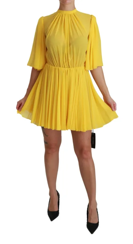 Dolce & Gabbana Yellow Pleated A-line Mini 100% Silk Dress sold by Siebentaschen