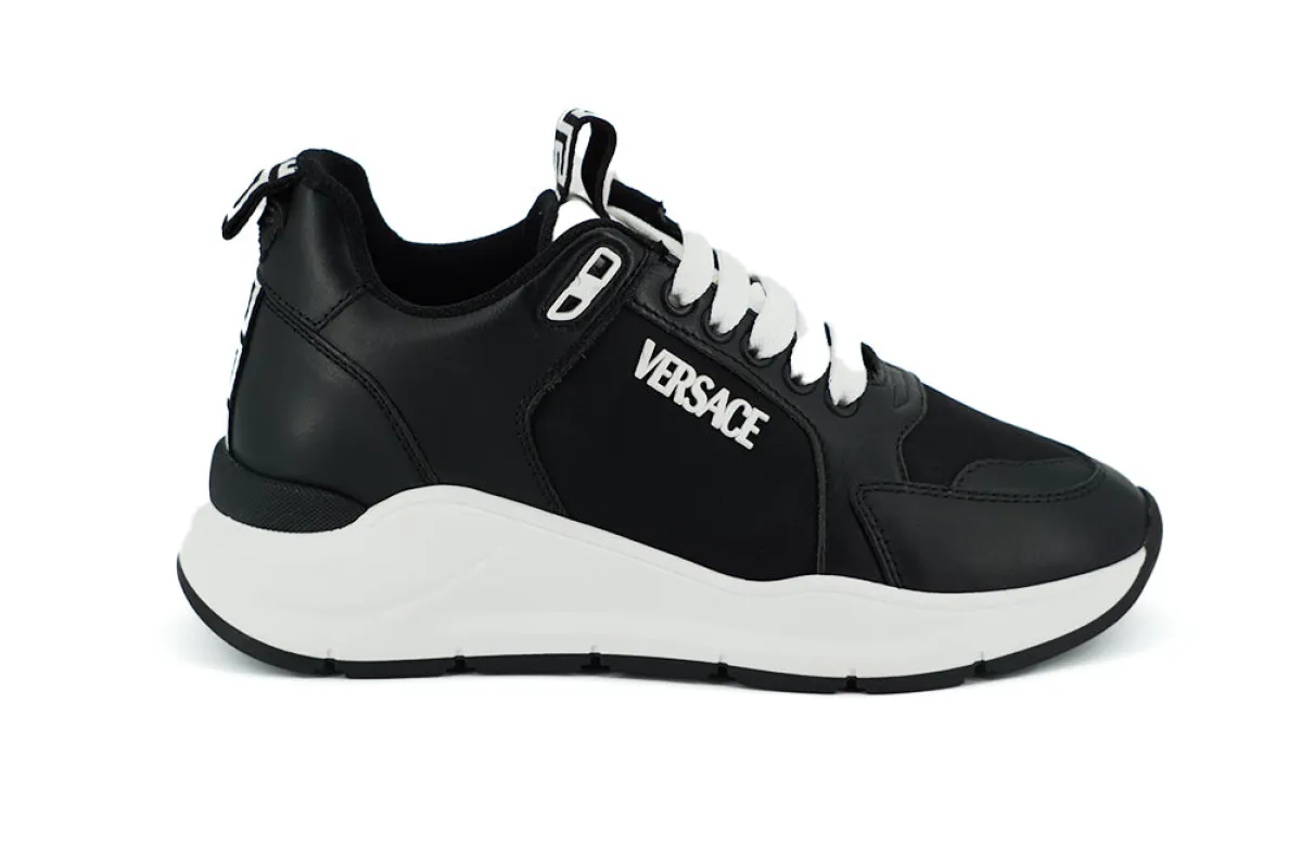 Versace Elegant Monochrome Leather Sneakers sold by Siebentaschen