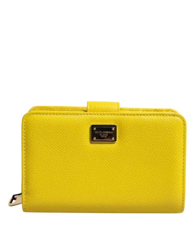 Dolce & Gabbana Yellow Leather Bifold Continental Clutch Wallet sold by Siebentaschen