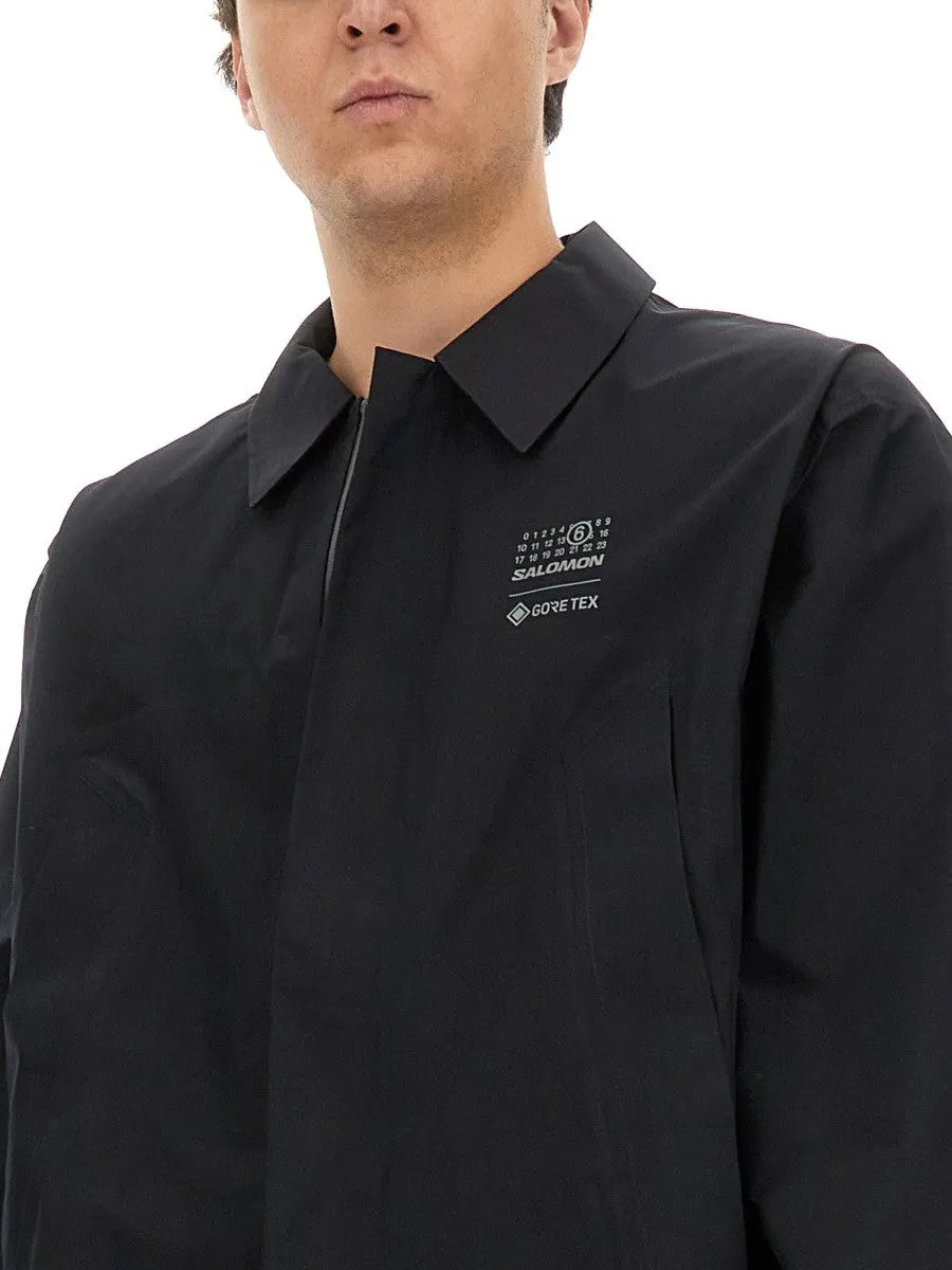 MM6 MAISON MARGIELA X SALOMON TRENCH COAT WITH LOGO sold by Siebentaschen product image thumbnail 2