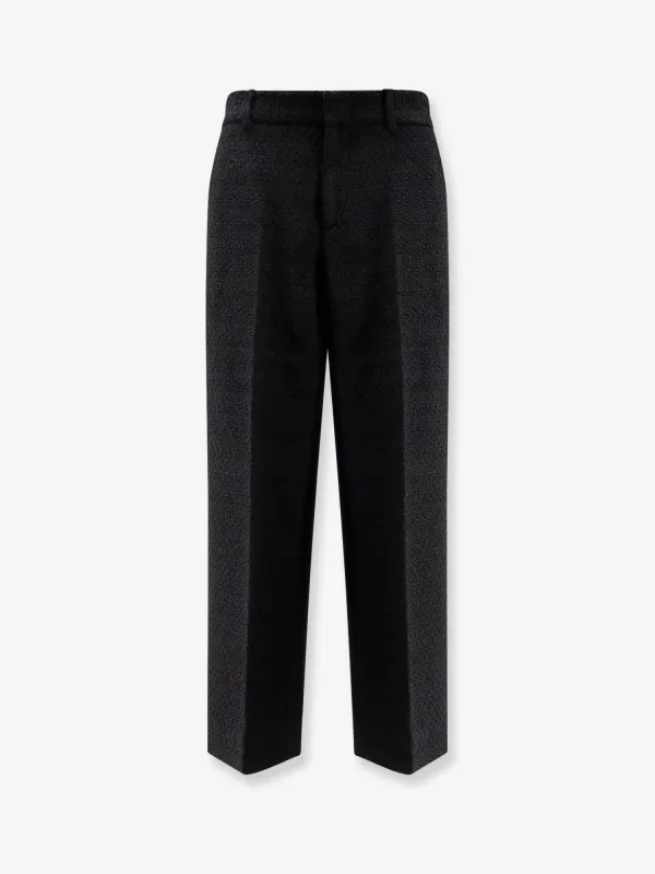 Gucci Wool tweed trousers sold by Siebentaschen