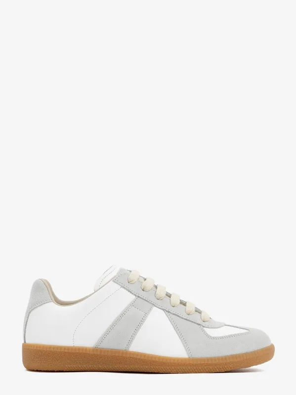 Maison Margiela Replica low-top leather sneakers with suede inserts sold by Siebentaschen