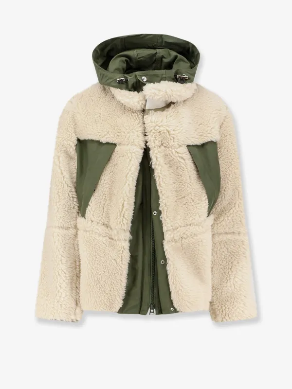 SACAI Eco shearling and nylon jacket sold by Siebentaschen