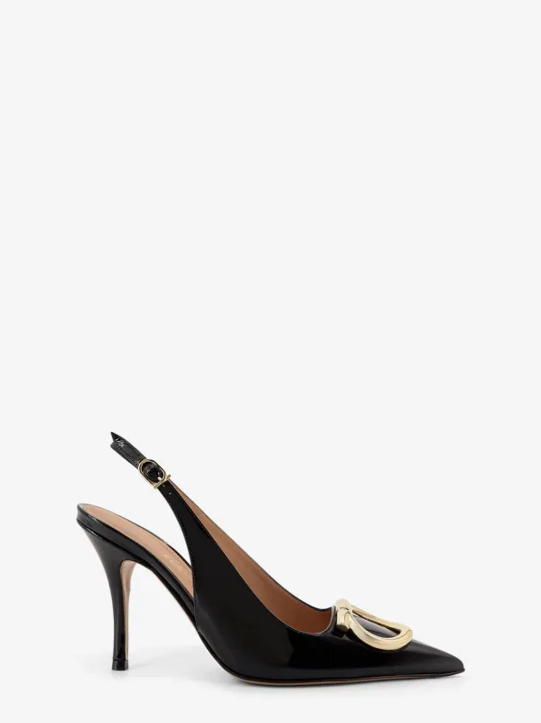 Ferragamo Sara patent leather slingback pumps sold by Siebentaschen