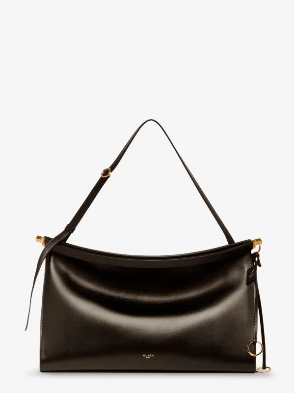 ALAIA East West leather bag with engraved logo made by Alaia
