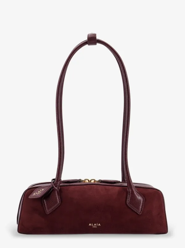 ALAIA Teckel Small suede shoulder bag sold by Siebentaschen