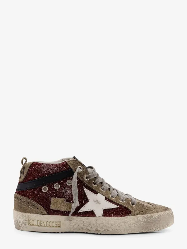 Golden Goose Deluxe Brand Mid Star Classic high-top suede sneakers with glitter inserts sold by Siebentaschen