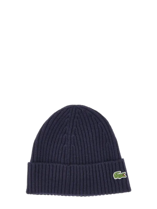 Lacoste BEANIE HAT sold by Siebentaschen