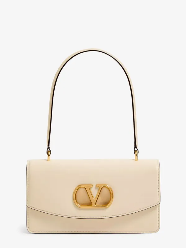 Valentino Garavani Leather Vlogo shoulder bag sold by Siebentaschen