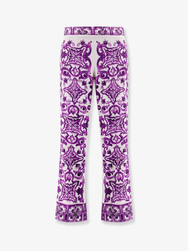 Dolce & Gabbana Silk trousers with Maiolica print sold by Siebentaschen