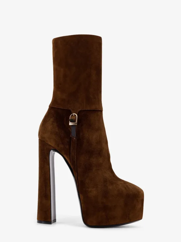 Saint Laurent Nico suede plateau ankle boots sold by Siebentaschen