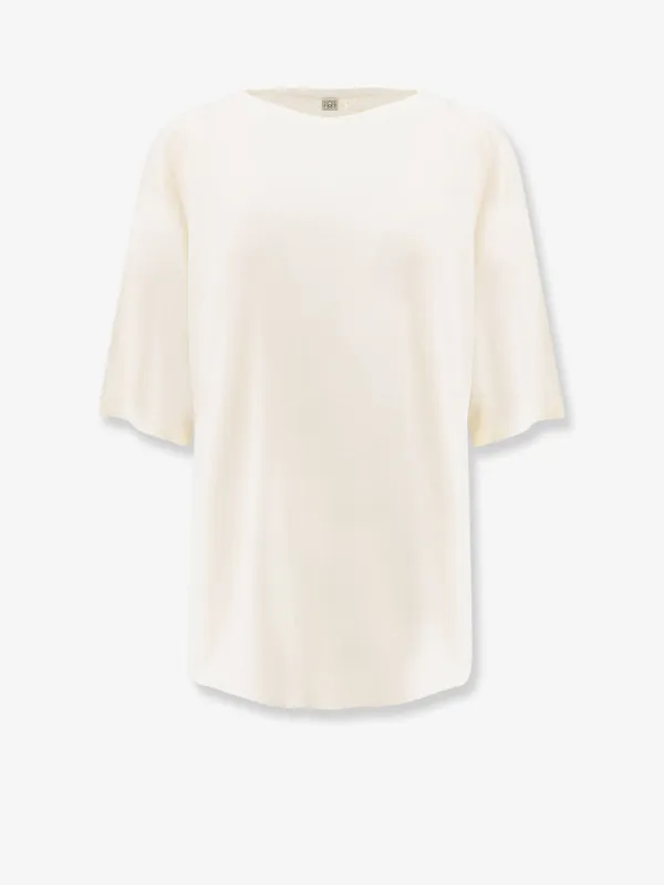 TOTEME Longline wool blend sweater sold by Siebentaschen