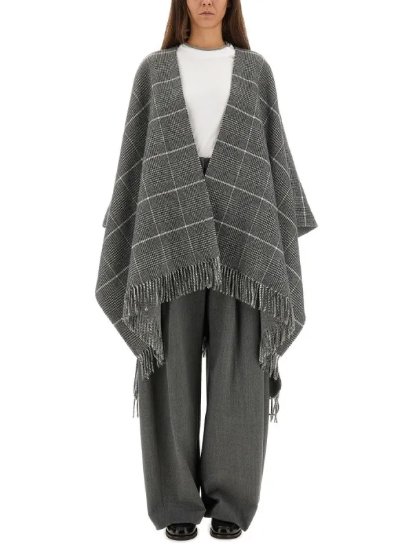 Brunello Cucinelli WOOL PONCHO WITH BANGS sold by Siebentaschen