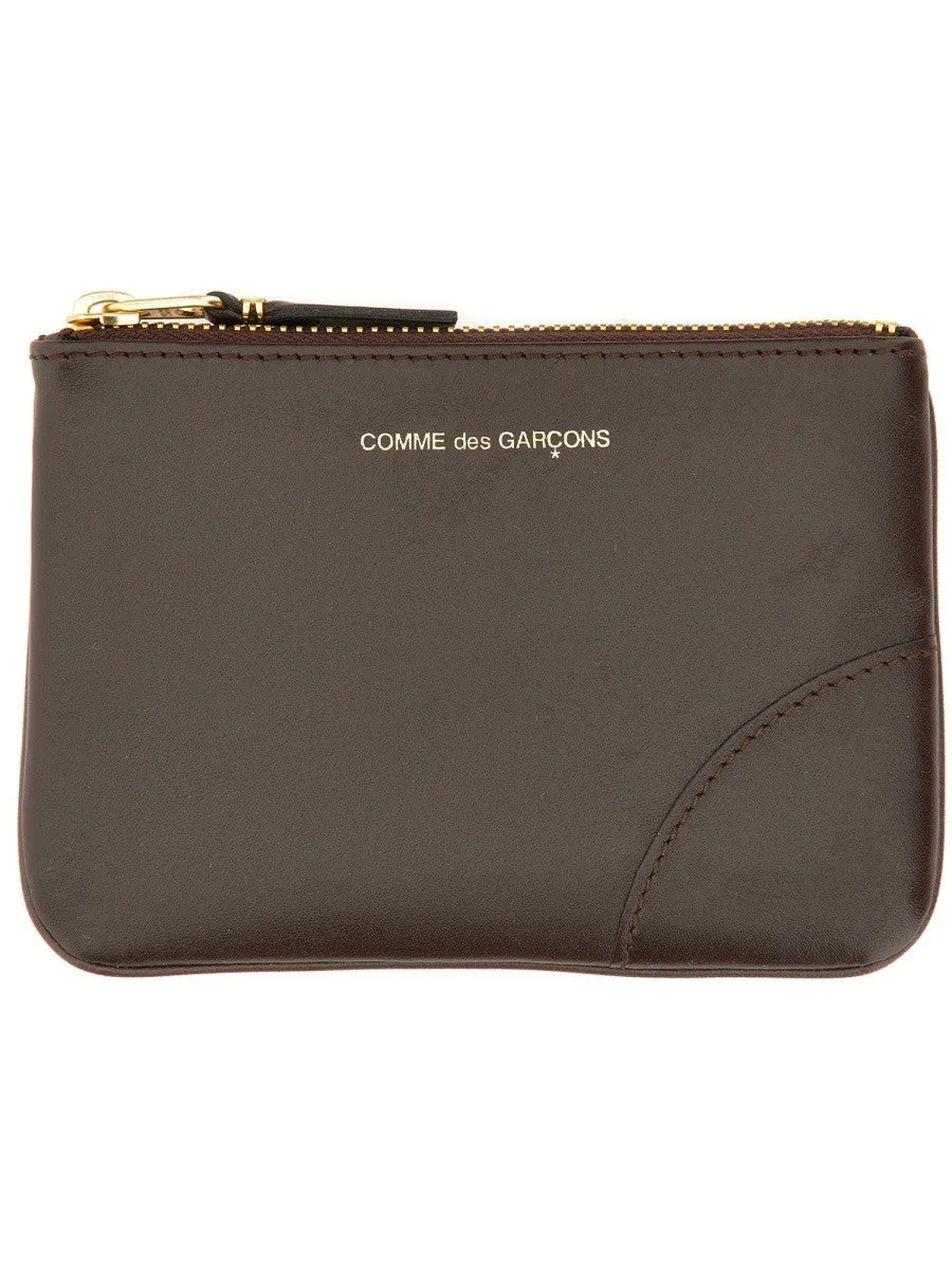 COMME DES GARCONS WALLET SMALL CLUTCH WITH ZIPPER sold by Siebentaschen