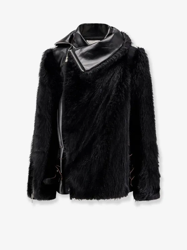 SACAI Leather Jacket with synthetic fur inserts sold by Siebentaschen