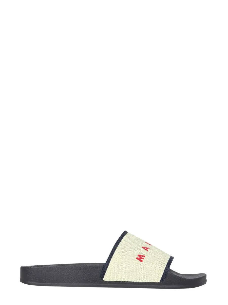 Marni SLIDE SANDALS WITH LOGO sold by Siebentaschen