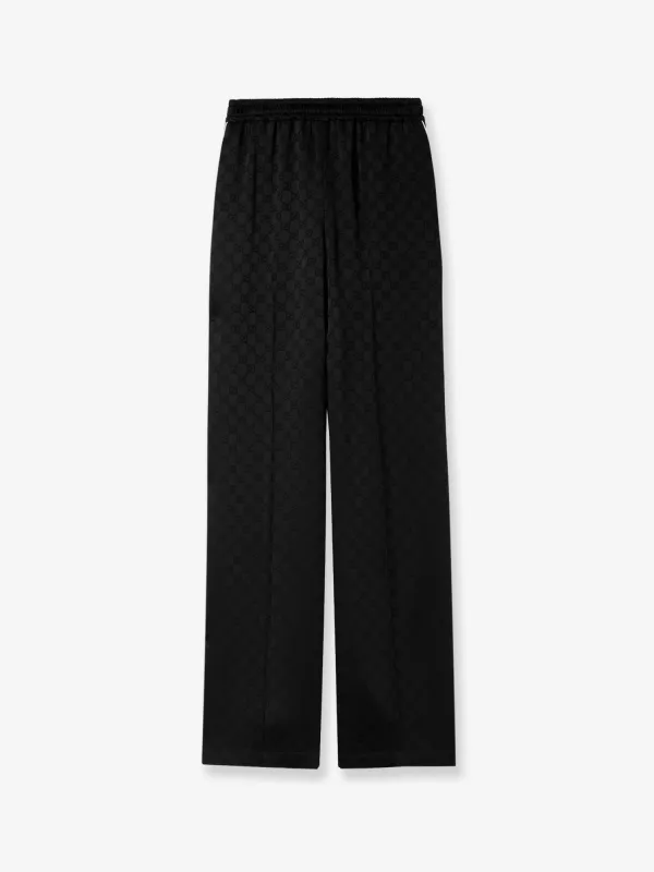 Gucci Viscose blend trousers with all-over GG motif sold by Siebentaschen