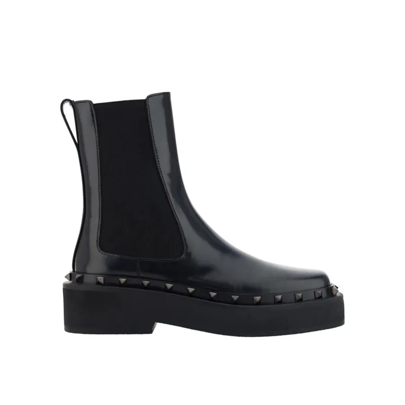 Valentino Garavani Rockstud M-Way Boots sold by Siebentaschen